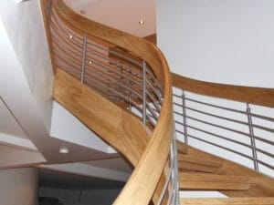 Modern Curved Oak and Stainless Steel Staircase