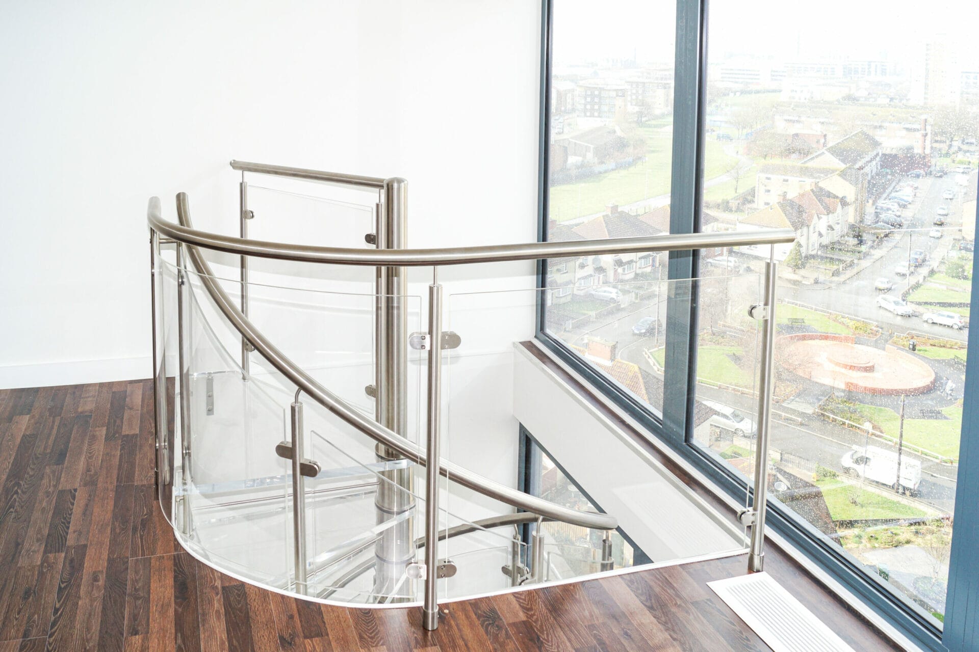 Penthouse spiral staircase with Acrylic treads