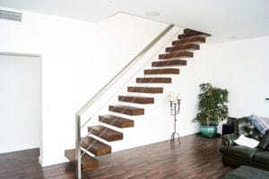 Oak and stainless steel floating stairs