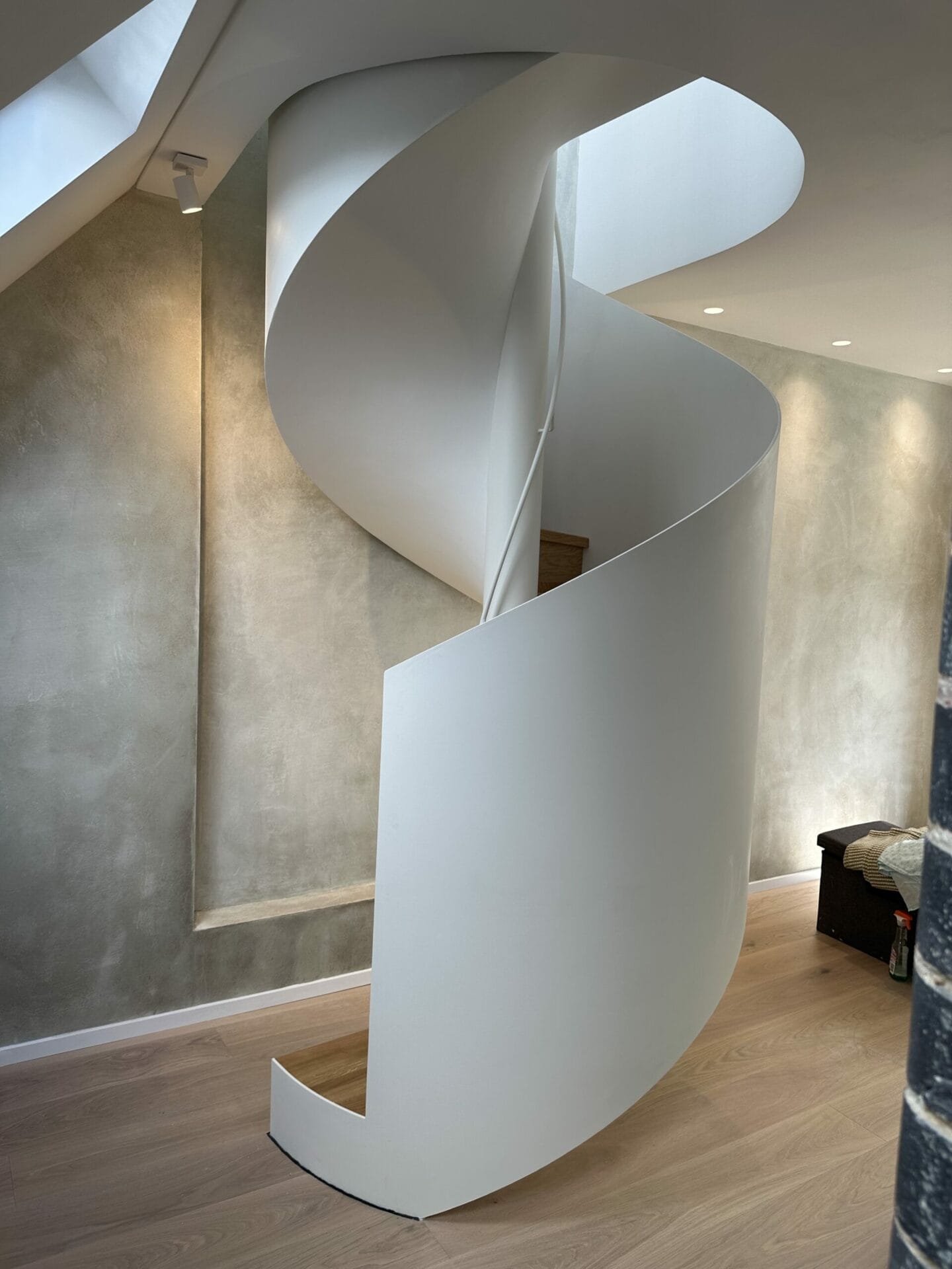 Internal Spiral Staircase Made of Curved Metal