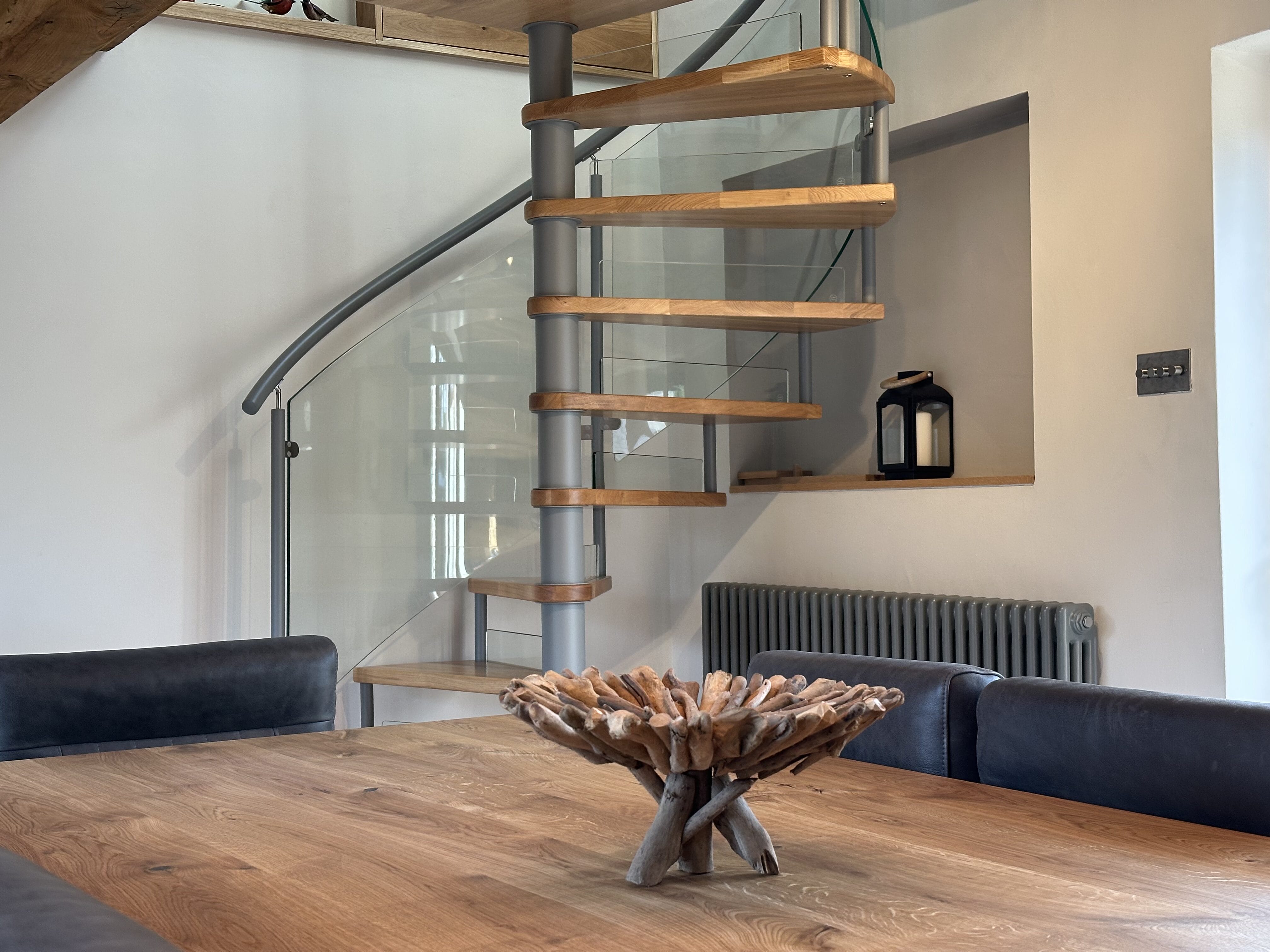 Spiral Staircase with oak treads and glass railing